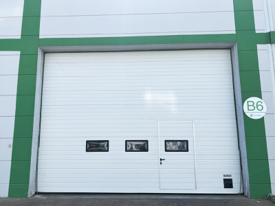 Up and down high speed garage door with small door for sale