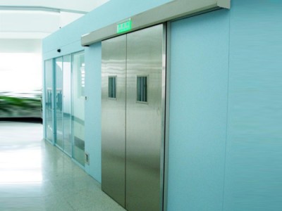 Analysis of the advantages and disadvantages of electric medical doors of different materials